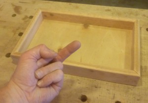 It's a tray, it's not a drawer - 45 degree joints, even though the tray is glued to the floor all around, is just Wrong.
